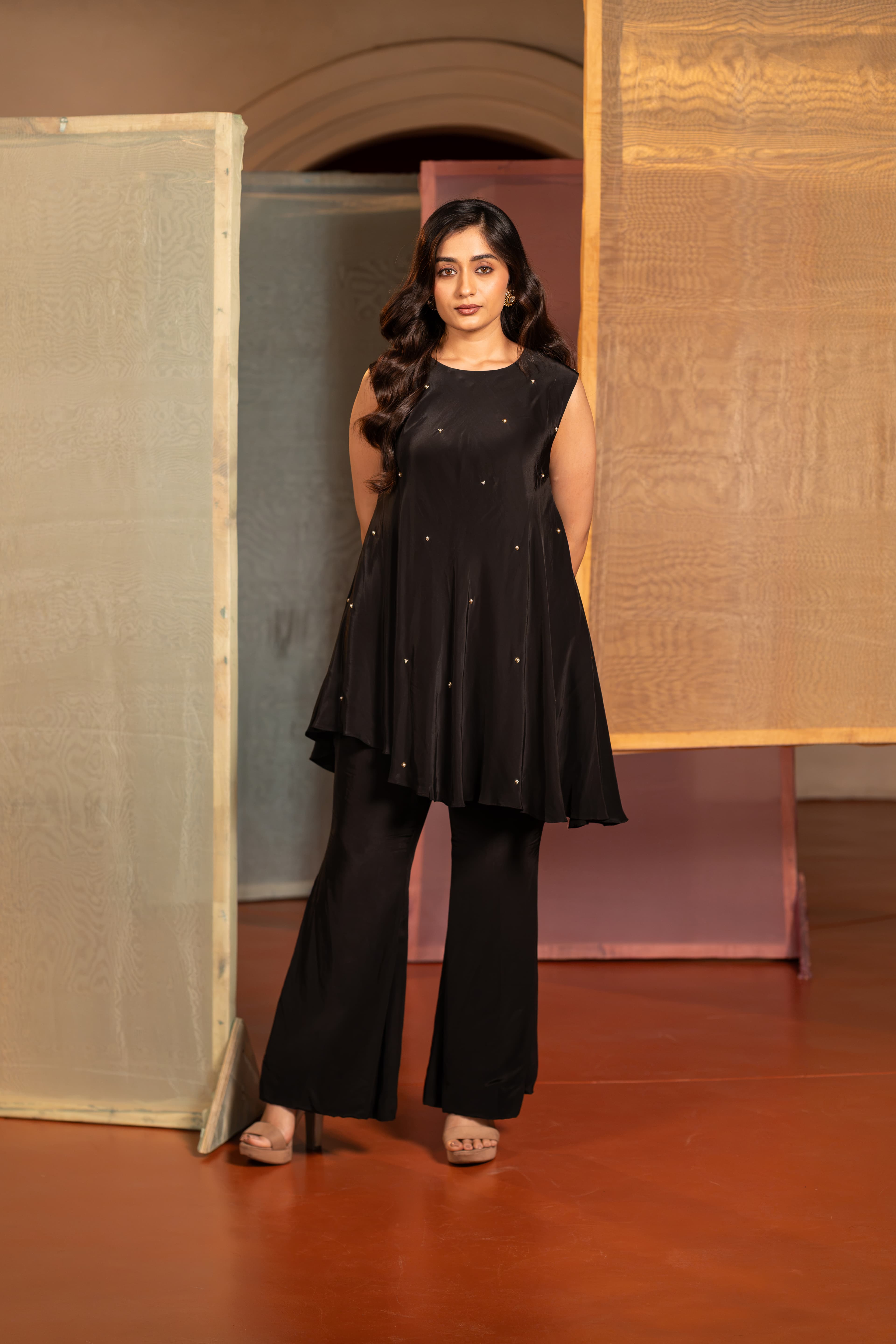 Black Indo Western Top and Bell Bottom Pant with Moti handwork.