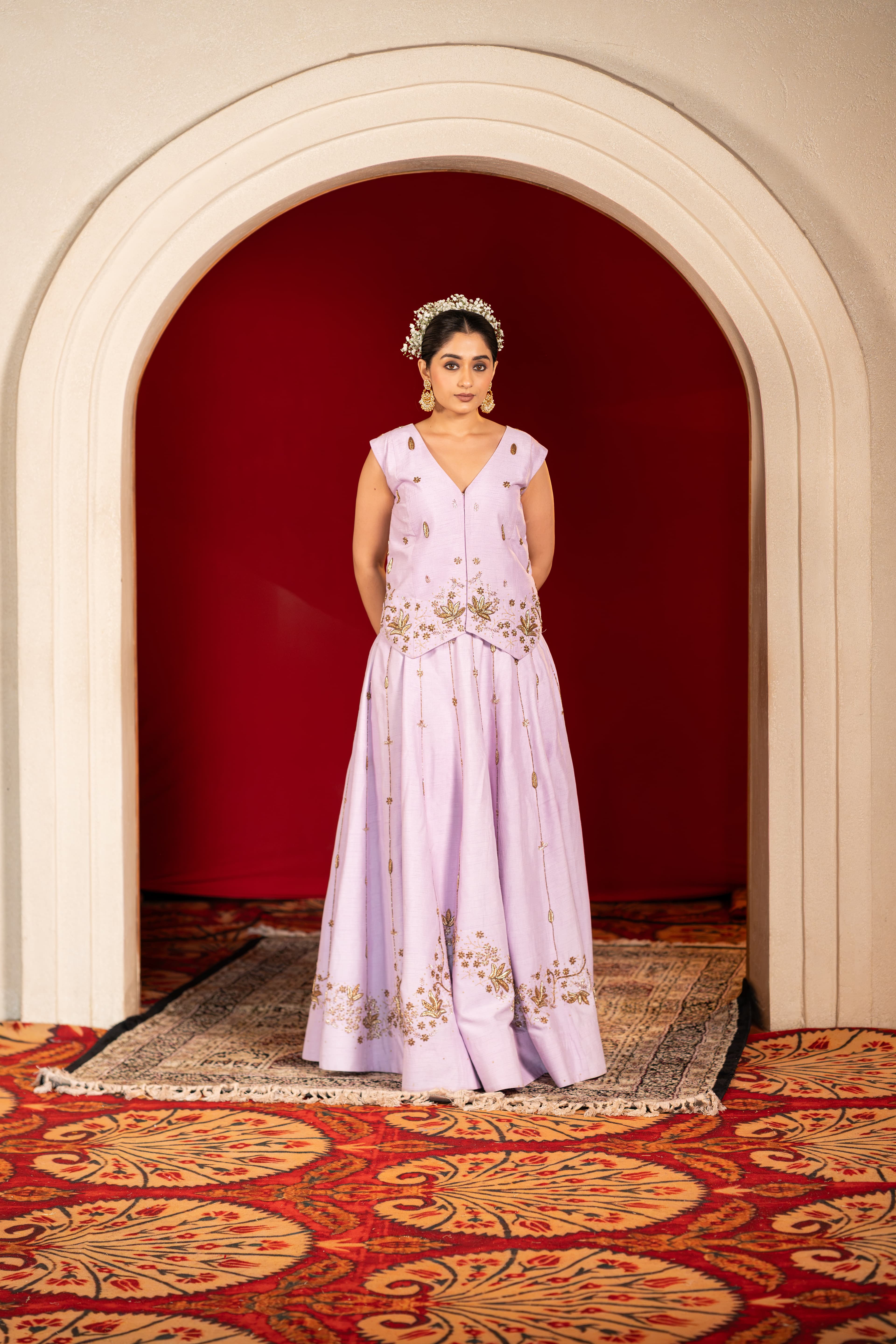 Lilac lehenga paired with a statement vest coat