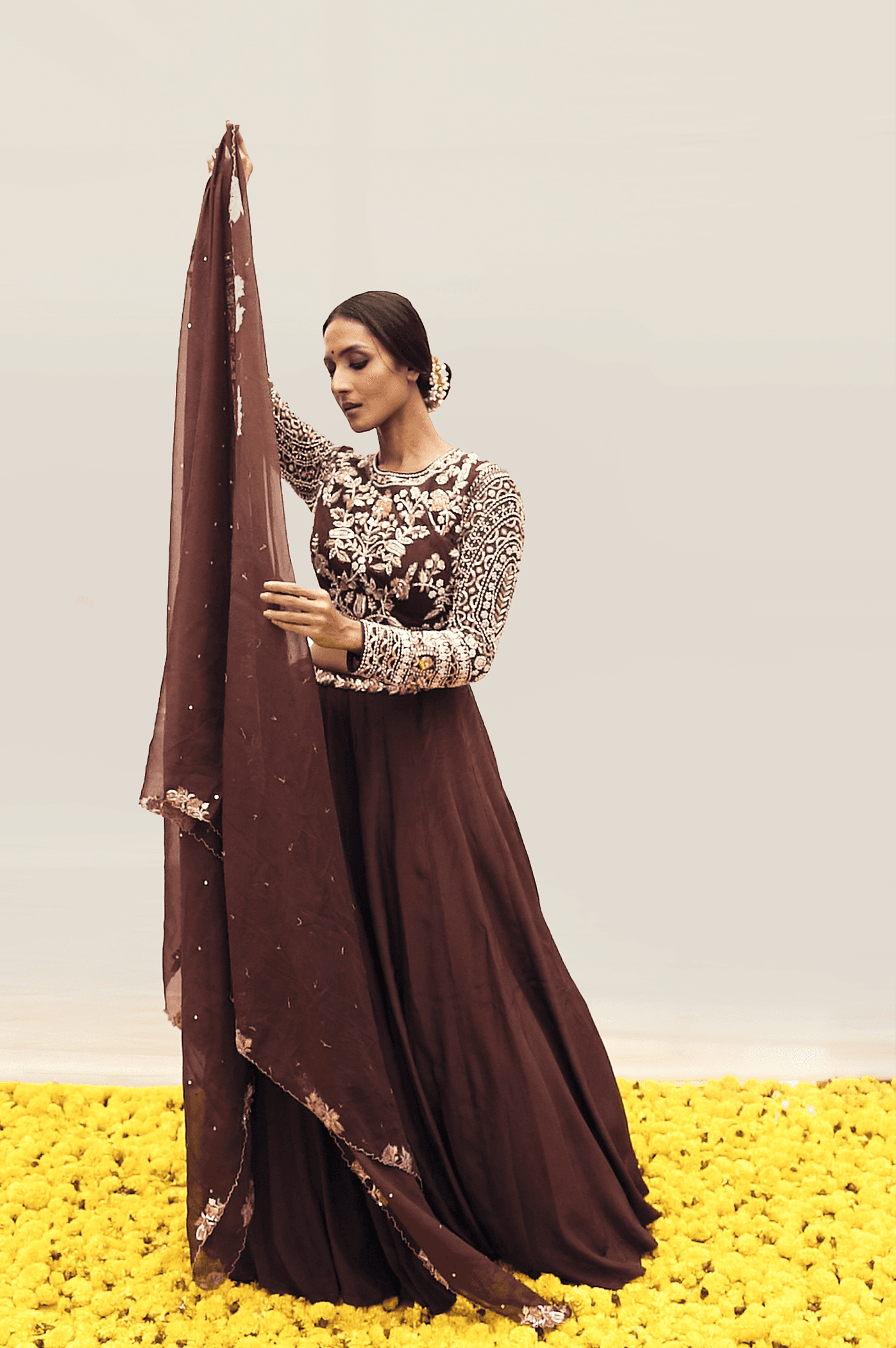 Craftsmanship detail — Brown Lehenga set with intricate handwork on Blouse