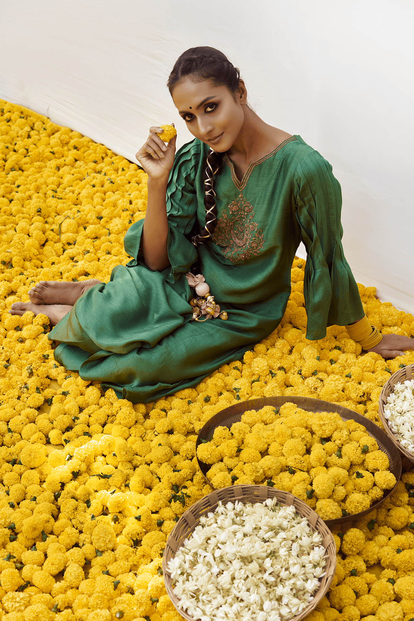 Craftsmanship detail — Forest Green kurta set with hand embellished motifs