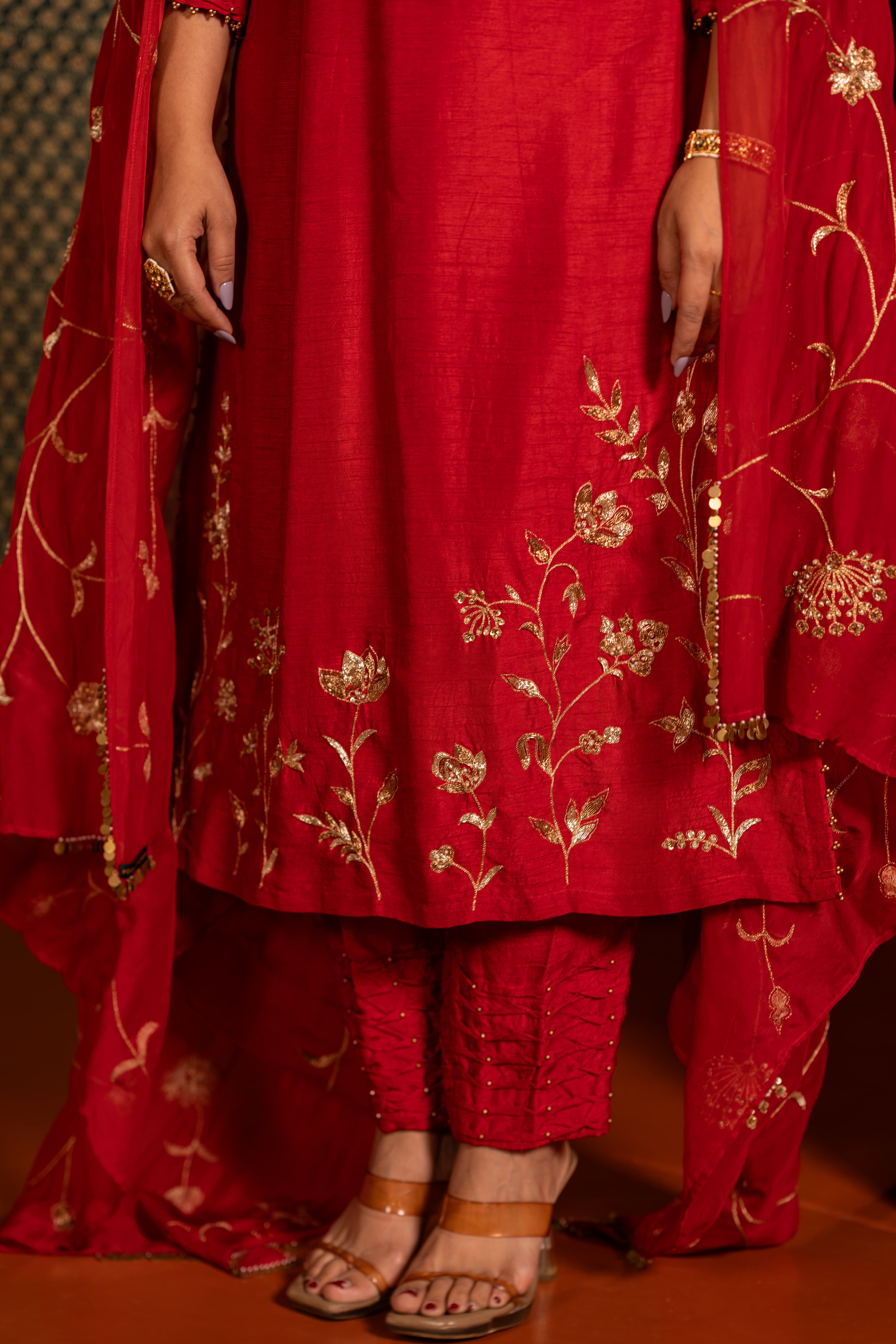 Craftsmanship detail — Red Kurta set with traditional floral handwork